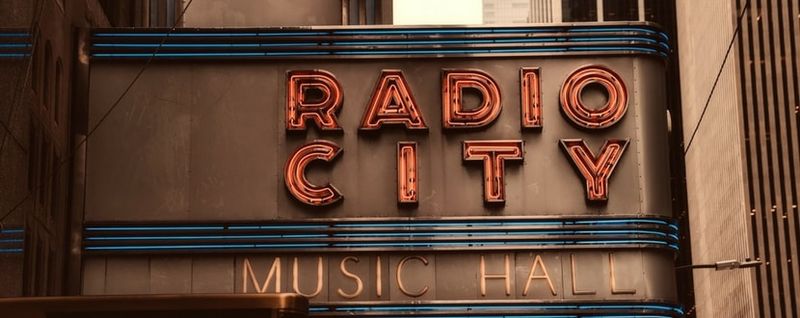 new-york-radio-city-music-hall-signboard-min