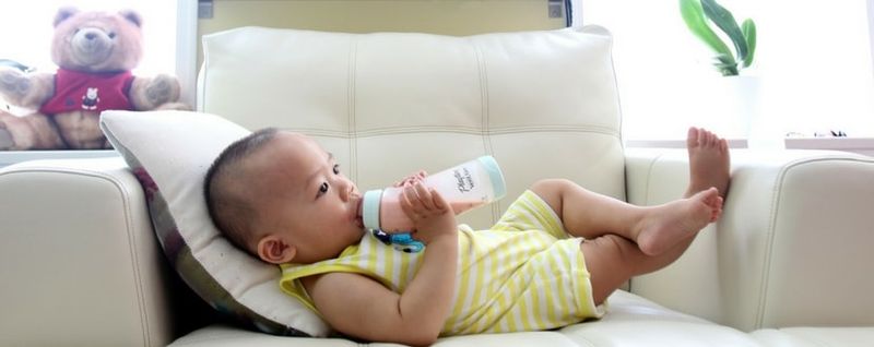 baby drinking infant formula milk - SingSaver