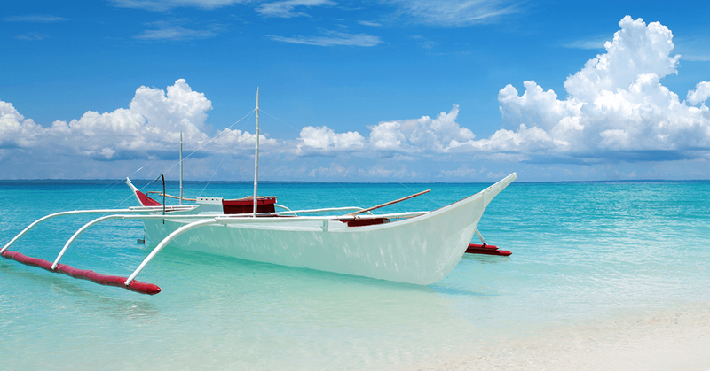 A boat on Cebu beach - SingSaver
