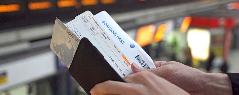 boarding pass in a passport -SingSaver